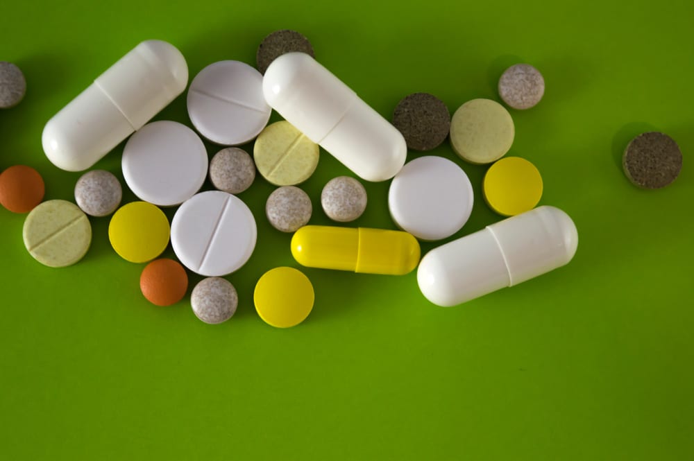 Various pills on a green table in Westmoreland County, PA