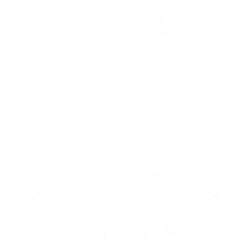 White circular logo with the words DreamLife Recovery around a large letter D in the center. The D has a wave-like line at its base, all set against a light background.