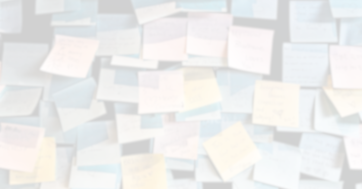 A wall covered with many overlapping pastel-colored sticky notes. The notes are blurred, making the handwriting on them unreadable, they represent an addict working on their gratitude, showing the gratitude therapy benefits.
